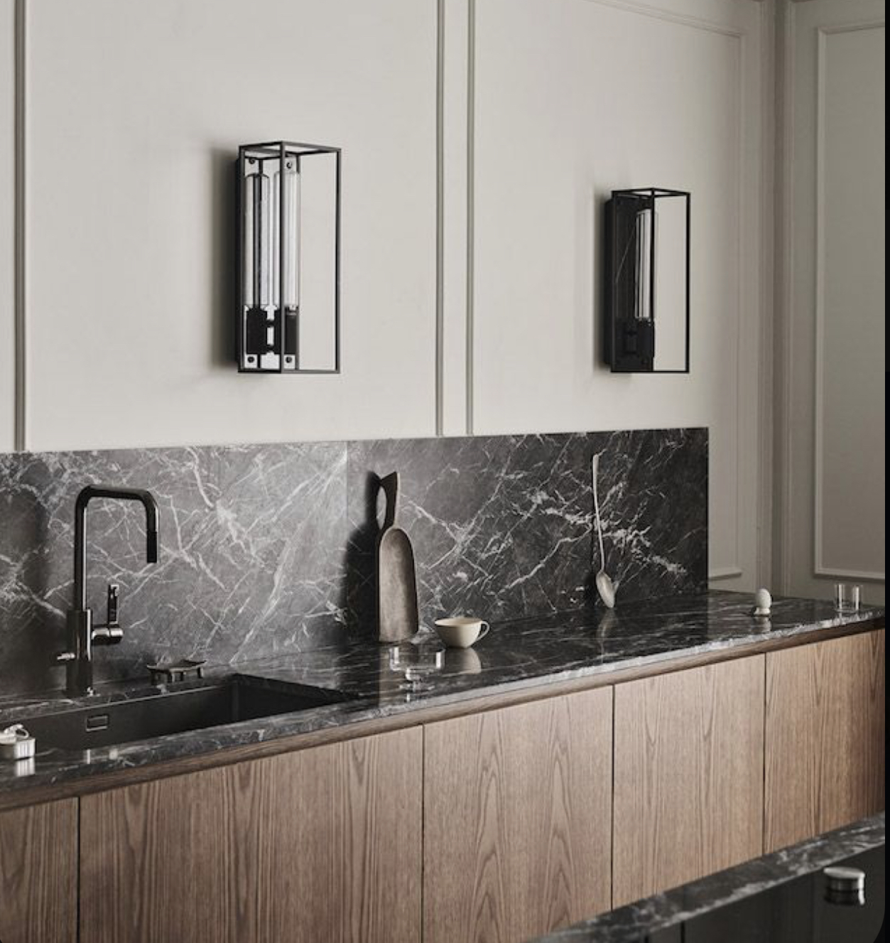 Why  a table top and a backsplash that made of the same material is a modern trend? IQ Kitchens works