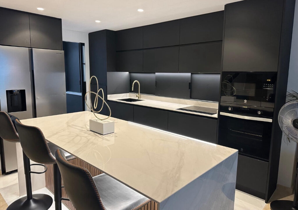Completion of a unique project by IQ Kitchens: Modern kitchen and laundry room in San Juan IQ Kitchens works