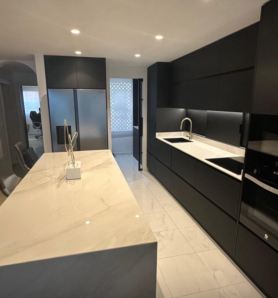 Completion of a unique project by IQ Kitchens: Modern kitchen and laundry room in San Juan IQ Kitchens works